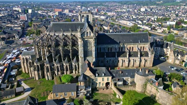 Historic city of Le Mans, with Cathedrale Saint-Julien, March&eacute; des Jacobins, surrounding urban area, Sarthe in France. Aerial drone orbiting