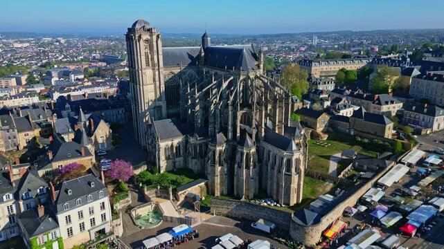 Impressive Le Mans Cathedral, Saint Julien, with March&eacute; des Jacobins, Sarthe in France. Aerial drone forward