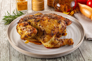 Baked in oven whole chicken with spices