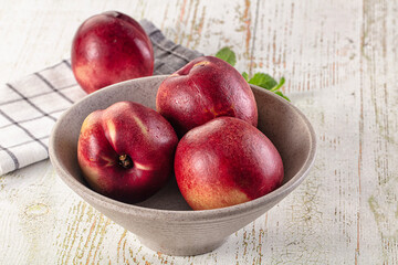 Ripe sweet juicy nectarines heap