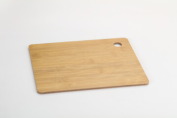 Wooden cutting board isolated on white background