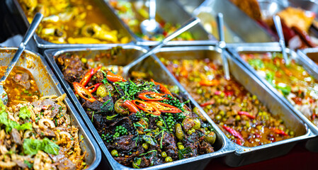 Thai street food sold at Banzaan Fresh Market in Patong, Phuket