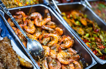 Thai street food sold at Banzaan Fresh Market in Patong, Phuket