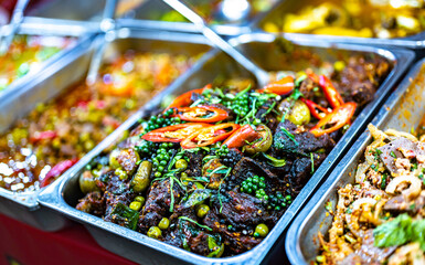 Thai street food sold at Banzaan Fresh Market in Patong, Phuket