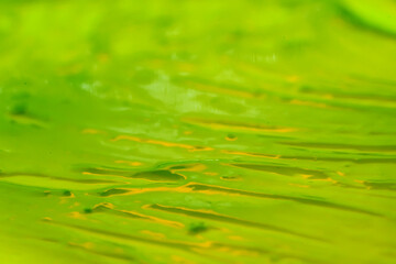 green paint abstract background, backdrop texture with strokes of green paint on the surface for overlay or design