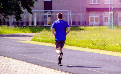 A man runs through the stadium
