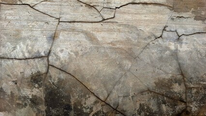 Old grunge concrete surface with weathered cement texture and rough stone patterns, ideal for...