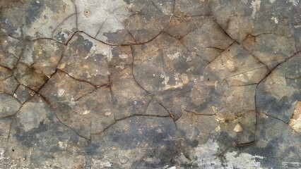 Grunge cement wall texture with weathered surface and distressed stone background, perfect for graphic or web design