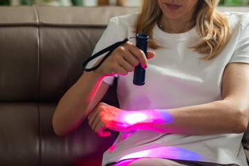 Infrared light therapy on the wrist reduces inflammation and pain from strain or arthritis. It...
