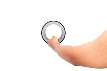 Hand holding circular object against white background for product presentation or demonstration