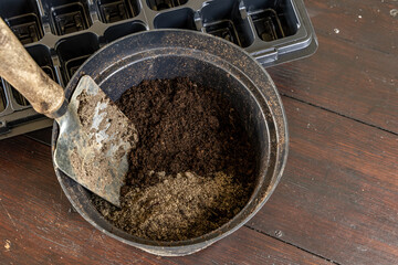 Plastic containers for molde seedlings plants, transplanting plants, plastic pots with soil,