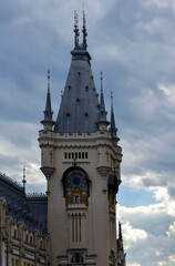 Tower of Palace of Culture in the Neo-Gothic style against stormy cloudy sky. Iasi, Romania. Copy space.