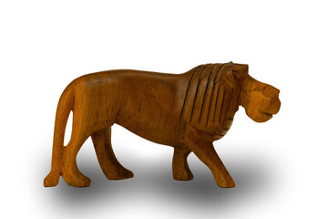 A traditional African hand-carved wooden lion souvenir, with a shadow, isolated against a white background