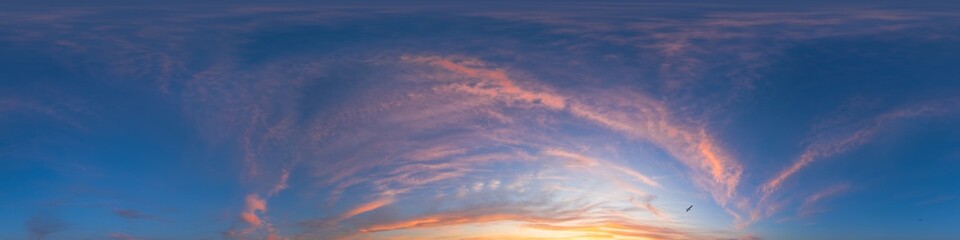 Seamless 360 HDR spherical panorama of sunset sky with vibrant pink Cirrus clouds. Full zenith or sky dome in 3D, sky replacement for aerial drone panoramas. Climate and weather change.