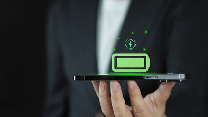 wireless charging station with a glowing LED light, charging multiple devices.Wireless charging station for multiple devices