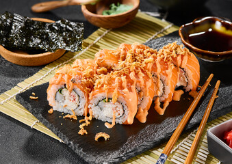 Salmon and crab roll with cucumber and spicy sauce, vibrant lighting, contemporary food styling