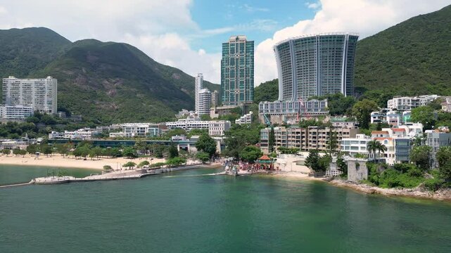 Repulse Bay, Hong Kong: Aerial drone footage of the Repulse Bay skyline and beach with the Tin Hau Temple in the south of Hong Kong island in China. 