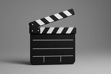 Film slate open for movie production showing black and white design