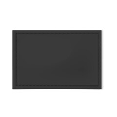 Fototapeta premium Rectangular black textile label with decorative stitching on all sides.