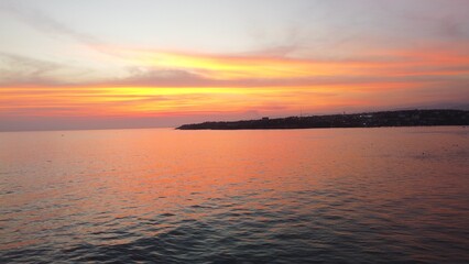 Obraz premium PHOTOGRAPHS OF A SUNSET DAY ON THE BEACHES OF ZICATELA IN PUERTO ESCONDIDO, MEXICO