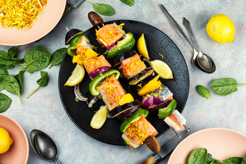 Skewers of fish salmon kabobs.