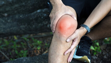 Man suffering from Knee pain, Joint pain, Arthritis and osteoarthritis. Medical concept.