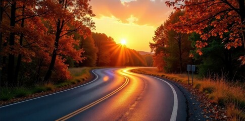 Fototapeta premium Autumn sunset casts long shadows on winding asphalt road , view, sun