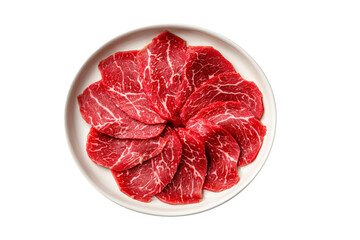 Raw beef slices on plate for cooking isolated on transparent background.