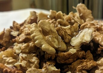 Walnuts. Fruits, kernels. In autumn, on tall trees with wide crowns, nut kernels ripen in a hard protective shell.