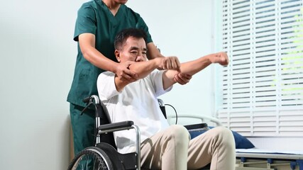 Asian physiotherapist helps senior patient on wheelchair with arm exercises during stroke recovery. Elderly care, rehabilitation - Powered by Adobe