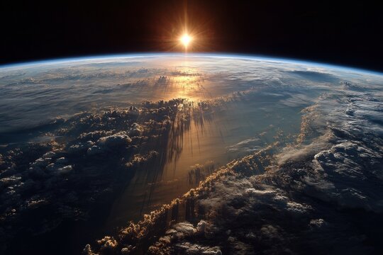 Radiant sunrise observed from orbit above planet, vibrant atmosphere and cloud cover with sunrays streaming toward the surface - Powered by Adobe