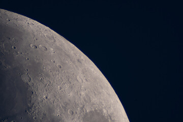 Detailed lunar surface view highlighting illuminated craters and plains. Planetary astrophotography Satellite of the Earth