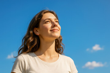 Hopeful Skyward Gaze — an ultra-realistic close-up portrait of a young woman standing beneath a vivid azure sky, chin gently lifted and lips curved in a peaceful smile as sunlight illuminates her face