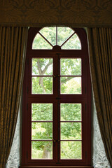 View through a castle window into the greenery