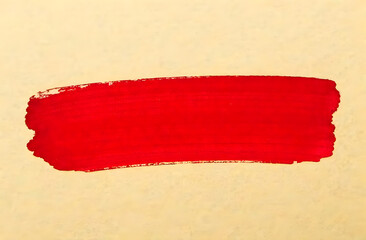 Wide Red paint brush stroke isolated on beige background	