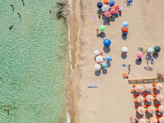 Summer Beach in Apulia (Salento): Aerial View of Vibrant Umbrellas and Turquoise Sea