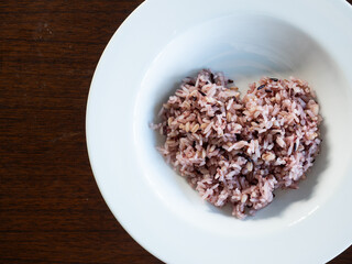 mix rice and cereal - rice, riceberry, mochi barley and red quinoa, in heart shape