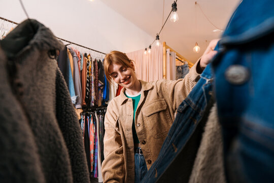 Fashion, shopping, sales and discount at swap shop. Retail store and customer at boutique