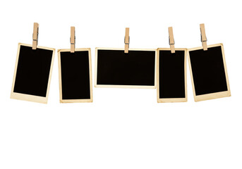 Isolated Collection of Blank Instant Photo Frames Hanging from Clothespins
