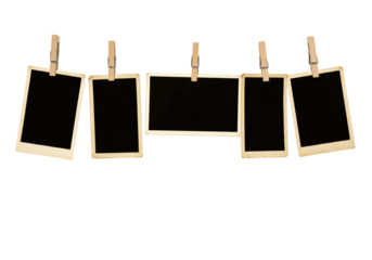 Isolated Collection of Blank Instant Photo Frames Hanging from Clothespins