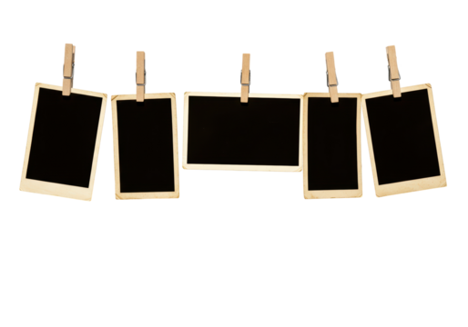 Isolated Collection of Blank Instant Photo Frames Hanging from Clothespins