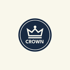 A sleek geometric crown logo in monochrome, designed with clean lines and sharp angles in circle frame, placed against a bright background