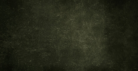 Dark green abstract background. Black green textured shabby backdrop of paper with paint, wall, school board. Green gradient decorative grunge wallpaper for design