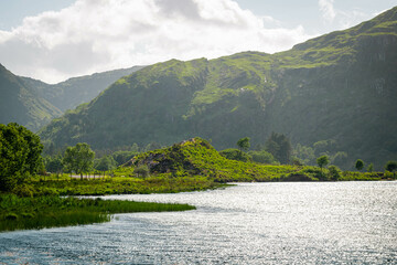 Fototapeta premium Beautiful view with mountain and river in the village Coomroe