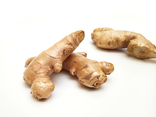 Fresh ginger rhizome or ginger root isolated on white background