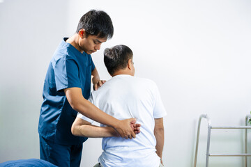 Fototapeta premium Doctor consulting with patient Back problems Physical therapy concept.