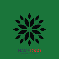 Floral emblem on green canvas: A modern graphic showcases a stylized floral design with sleek, dark petals, centrally positioned against a verdant backdrop. Evoking themes of natural beauty.