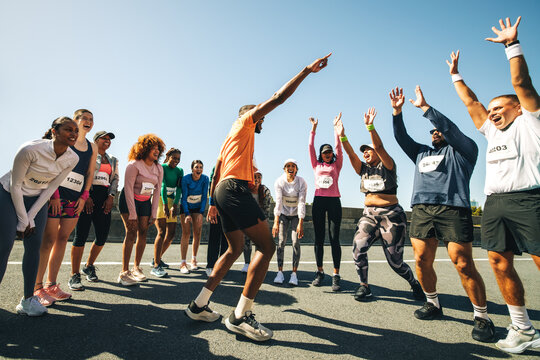 Cheerful group participating in a vibrant marathon event