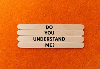 Do you understand me message written on wooden sticks on orange background. Conceptual do you...