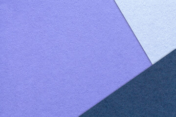 Abstract violet, sky, navy blue paper background with copy space. Template for presentation,...